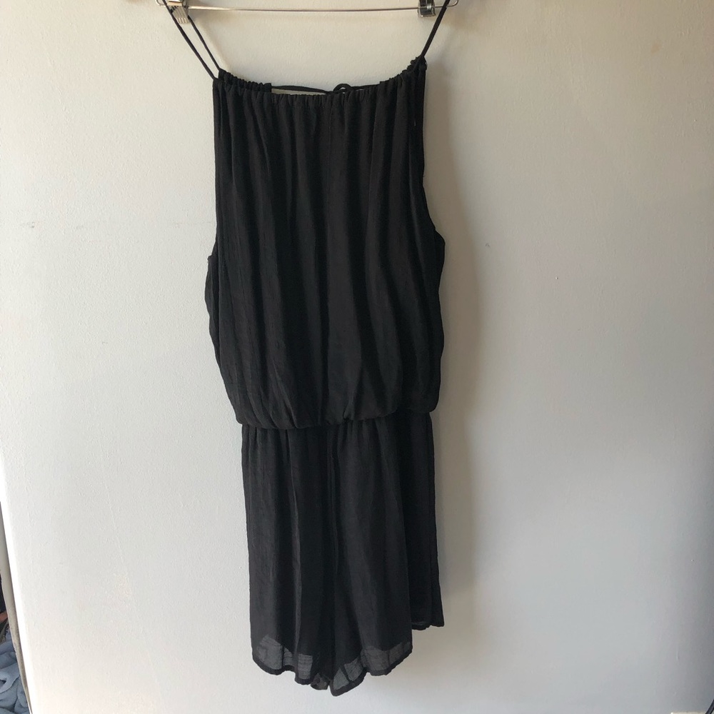 Black romper with adjustable back/straps